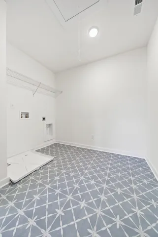 a street sign on a wall with sign board