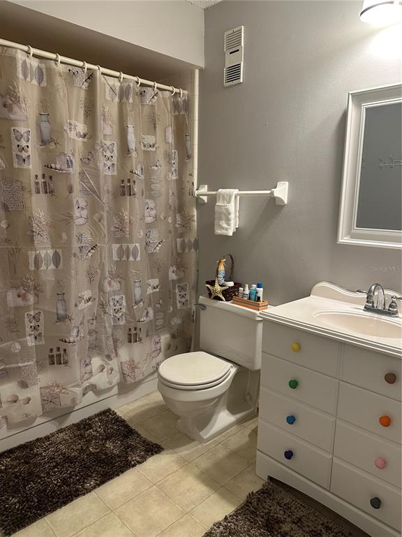 600 Cranes Way, Unit 204 Altamonte Springs, FL 32701 - Photo 17 of 26 a bathroom with a sink toilet and shower