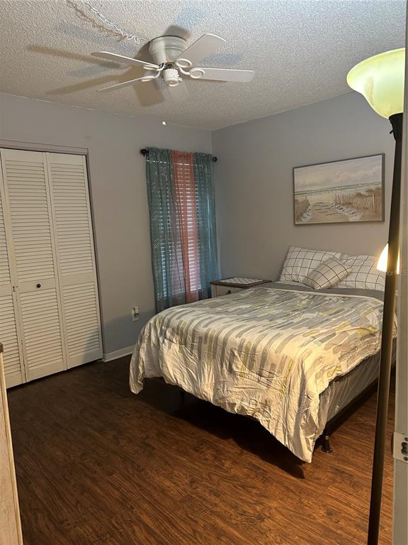 600 Cranes Way, Unit 204 Altamonte Springs, FL 32701 - Photo 18 of 26 a bedroom with a bed and wooden floor