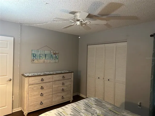 a view of a dresser with wooden floor