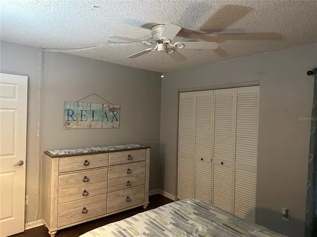 a view of a dresser with wooden floor