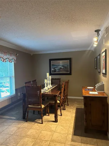 a workspace with furniture and window