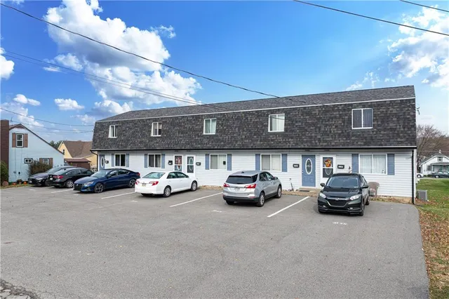 a car parked in front of a building