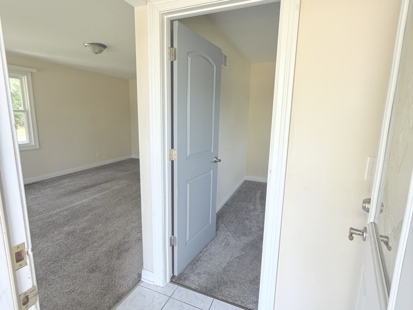 8356 South 78th Avenue Bridgeview, IL 60455 - Photo 8 of 39 a view of a hallway with a white walls