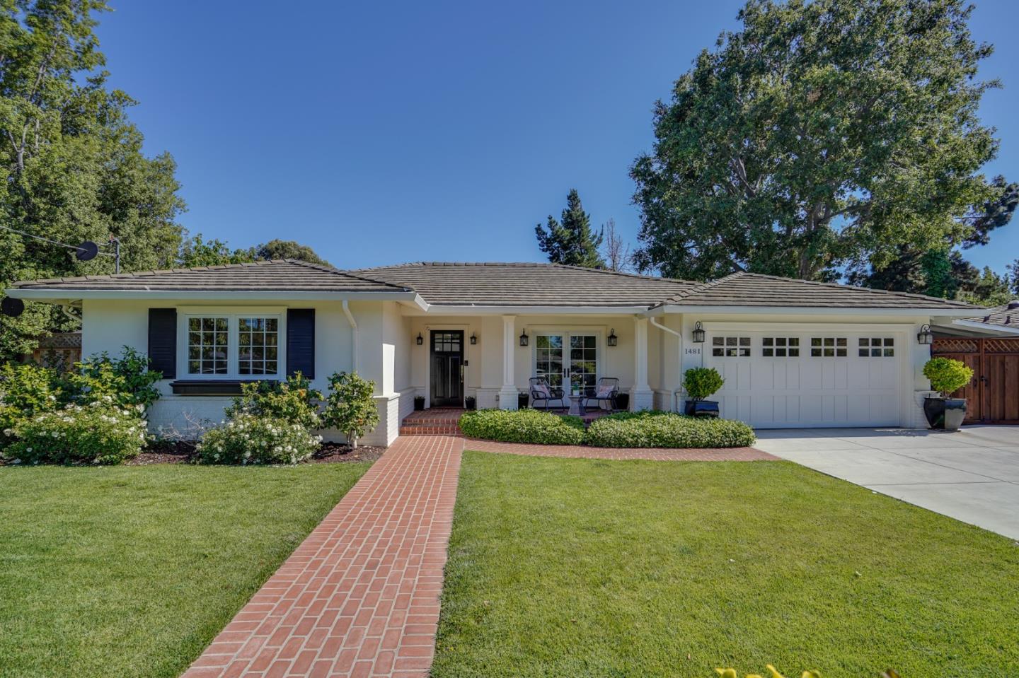 1481 Brookmill Road Los Altos, CA 94024 - Photo 1 of 55 a front view of a house with a yard and potted plants