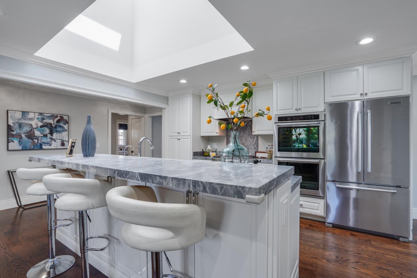 1481 Brookmill Road Los Altos, CA 94024 - Photo 11 of 55 a kitchen with stainless steel appliances granite countertop a sink refrigerator and cabinets