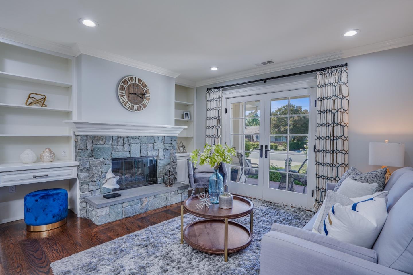 1481 Brookmill Road Los Altos, CA 94024 - Photo 13 of 55 a living room with furniture and a fireplace