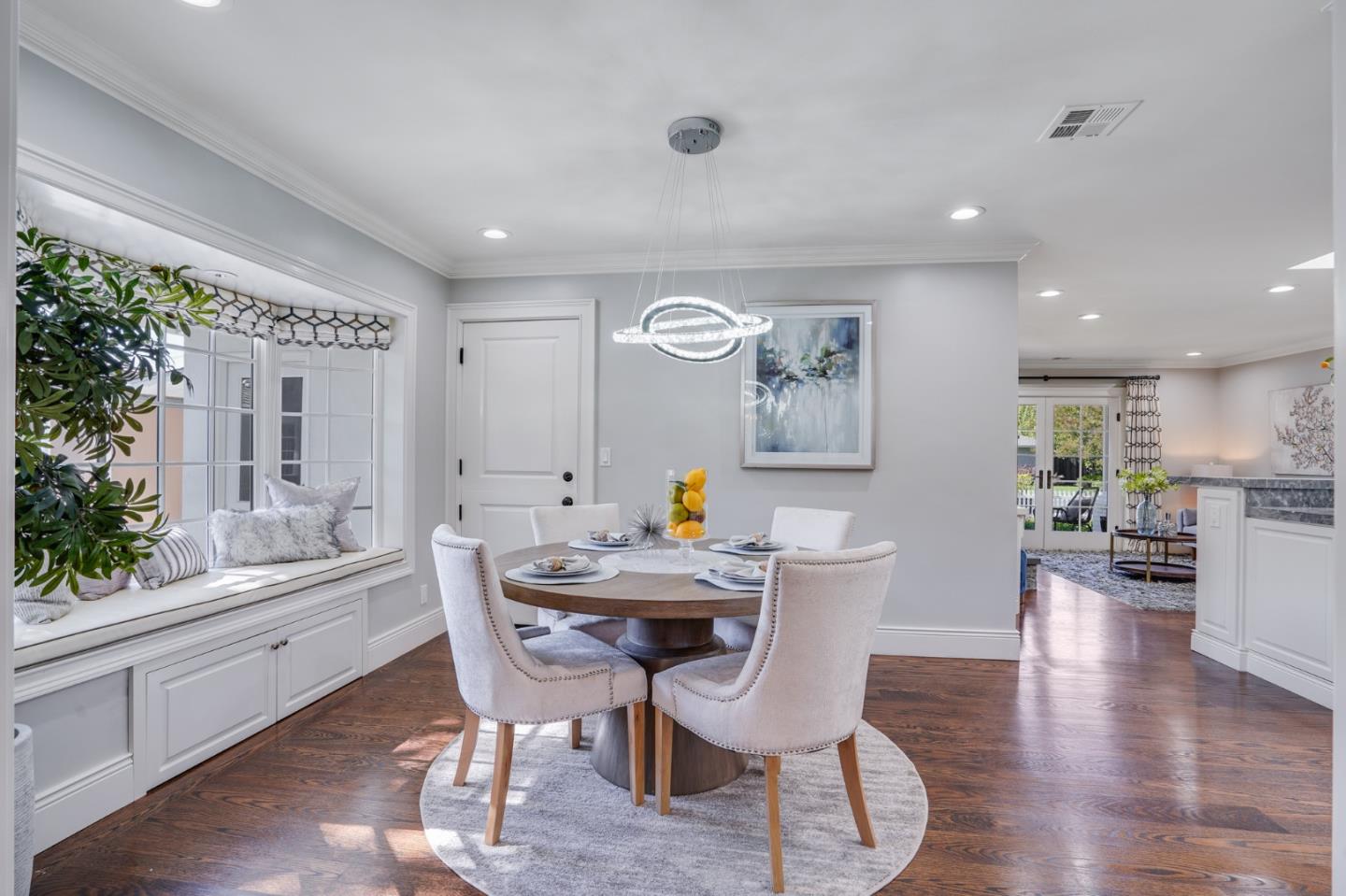 1481 Brookmill Road Los Altos, CA 94024 - Photo 15 of 55 a view of a dining room with furniture window and wooden floor