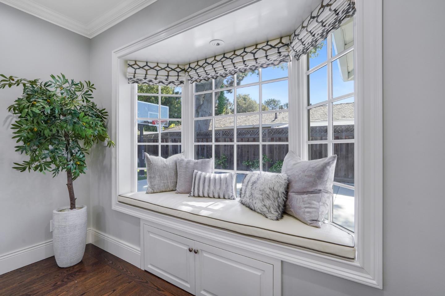 1481 Brookmill Road Los Altos, CA 94024 - Photo 16 of 55 a room with furniture and a potted plant