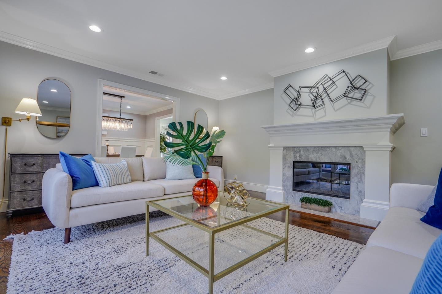 1481 Brookmill Road Los Altos, CA 94024 - Photo 21 of 55 a living room with furniture and a fireplace