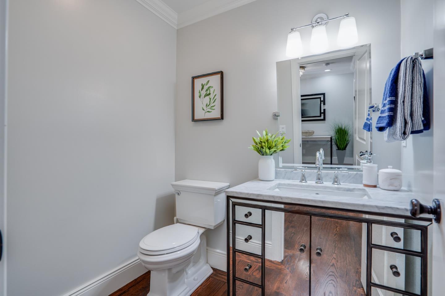 1481 Brookmill Road Los Altos, CA 94024 - Photo 22 of 55 a bathroom with a granite countertop toilet sink and mirror