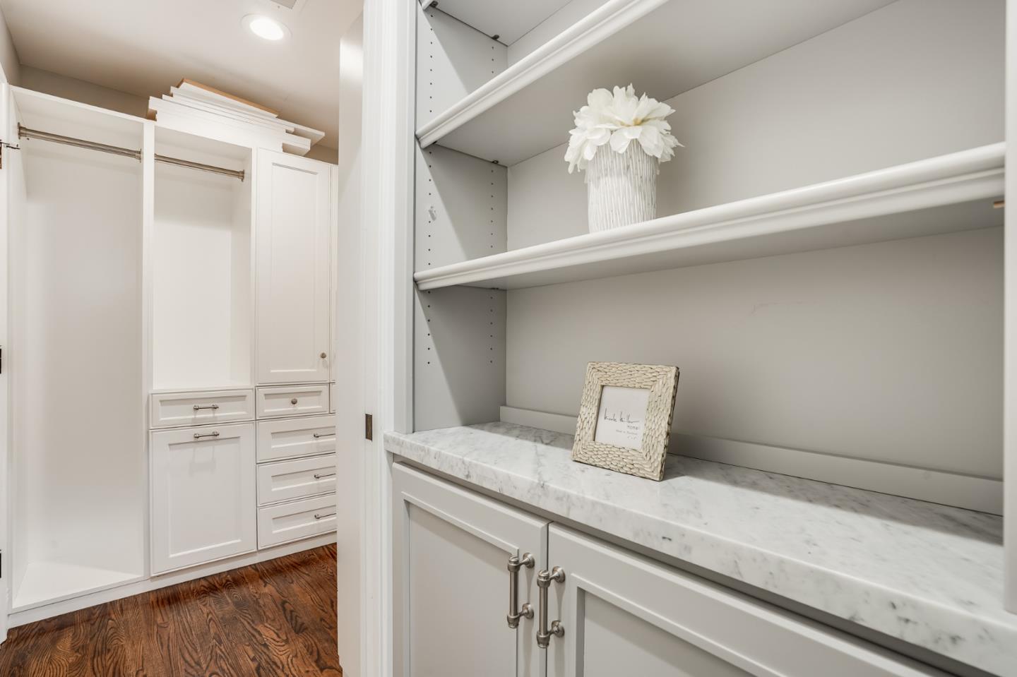 1481 Brookmill Road Los Altos, CA 94024 - Photo 28 of 55 a bathroom with a sink a mirror and a shower