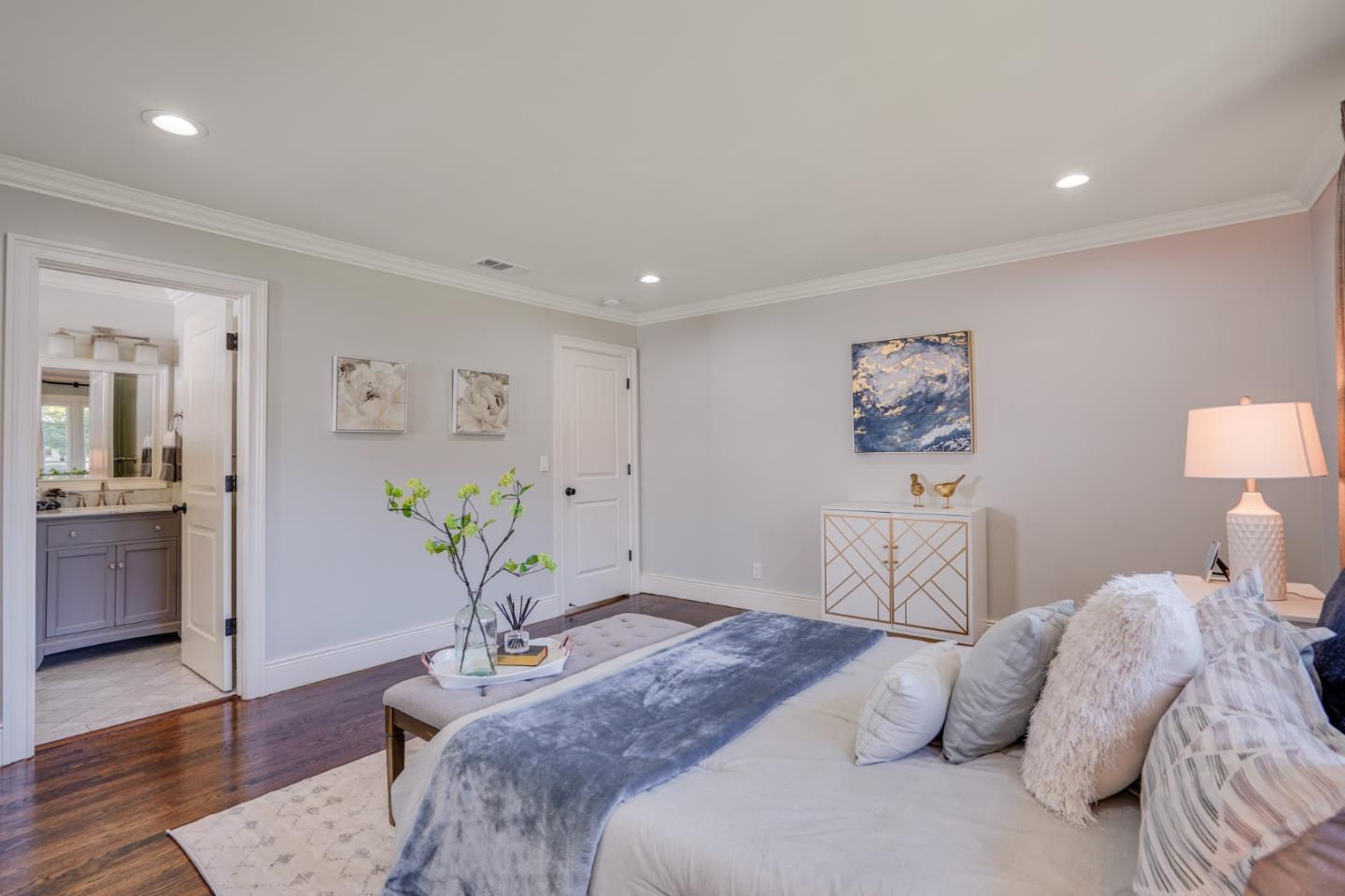 1481 Brookmill Road Los Altos, CA 94024 - Photo 31 of 55 a bedroom that has a bed and a potted plant on dresser