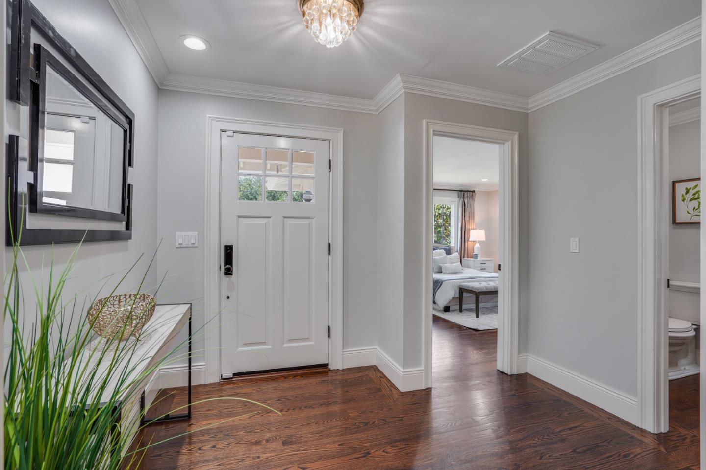1481 Brookmill Road Los Altos, CA 94024 - Photo 5 of 55 a view of a livingroom with wooden floor and a bedroom
