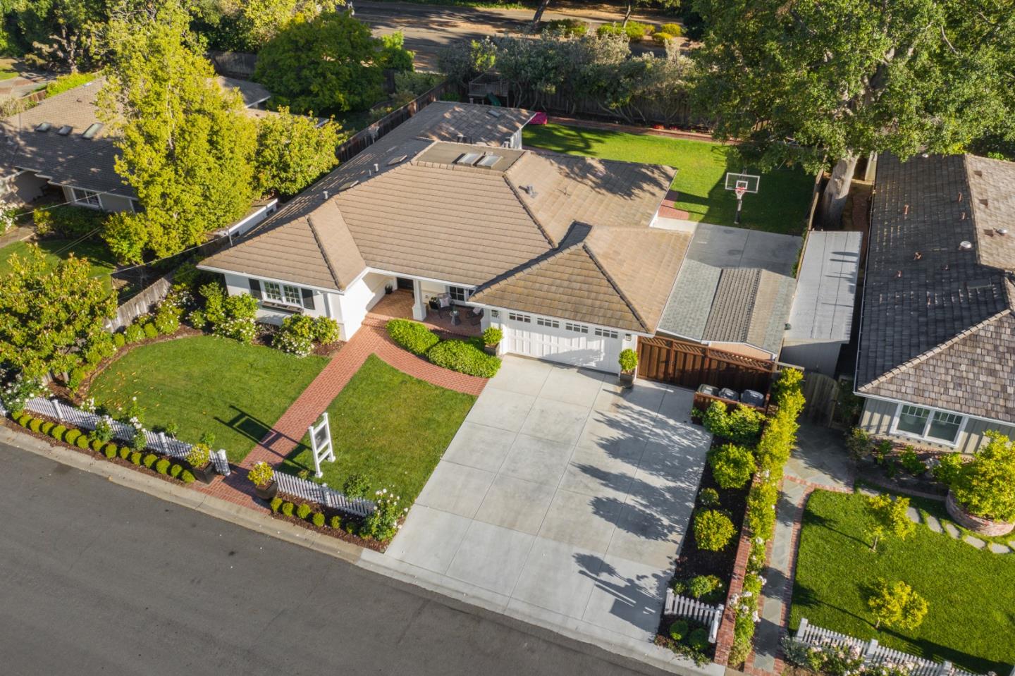 1481 Brookmill Road Los Altos, CA 94024 - Photo 49 of 55 an aerial view of a house with swimming pool patio and outdoor seating
