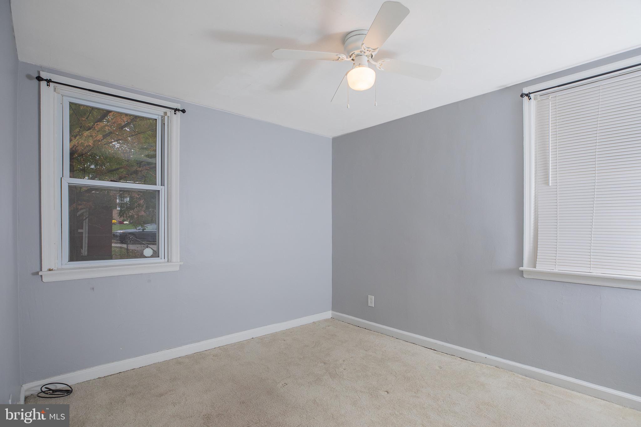 237 Miner Street Malvern, PA 19355 - Photo 12 of 35 Bedroom 1 with Ceiling Fan and Two Windows