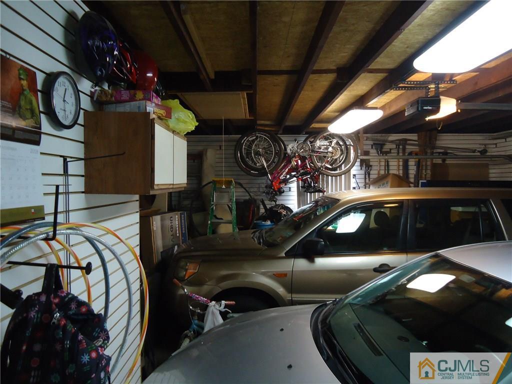 141 Long Hill Road Colonia, NJ 07067 - Photo 8 of 22 a view of car parked in garage
