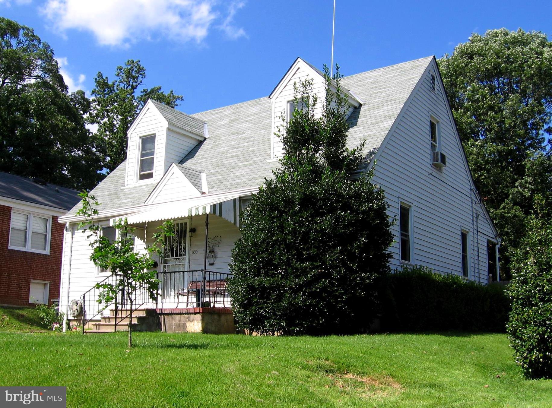 655 Coleraine Road Baltimore, MD 21229 - Photo 2 of 3 a view of a house with a yard