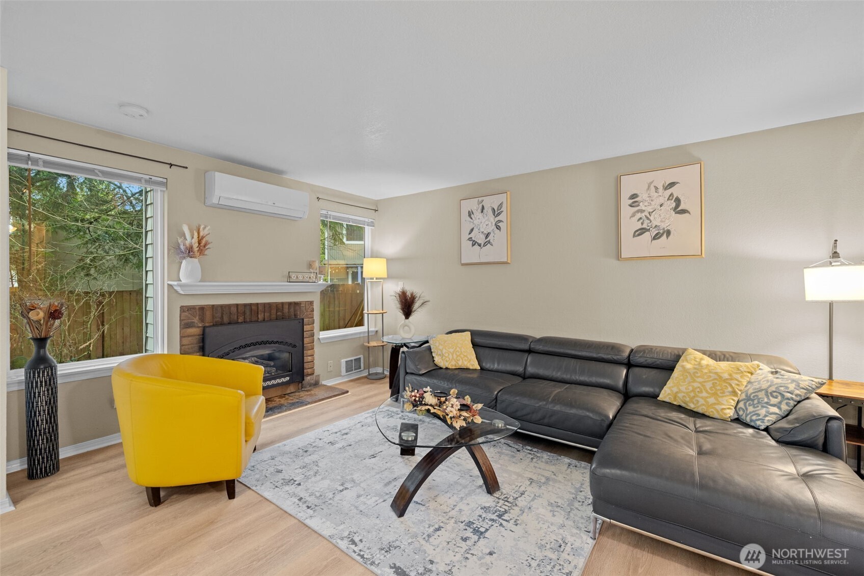 18429 20th Drive Southeast Bothell, WA 98012 - Photo 11 of 26 a living room with furniture and a fireplace
