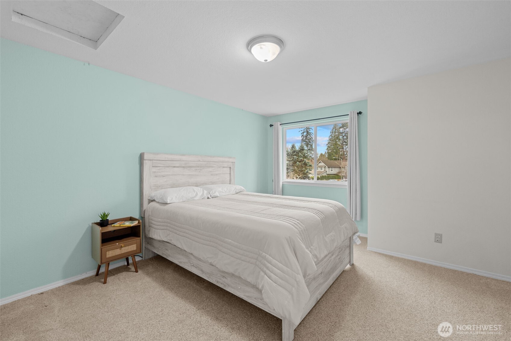 18429 20th Drive Southeast Bothell, WA 98012 - Photo 18 of 26 a bedroom with a bed and a window