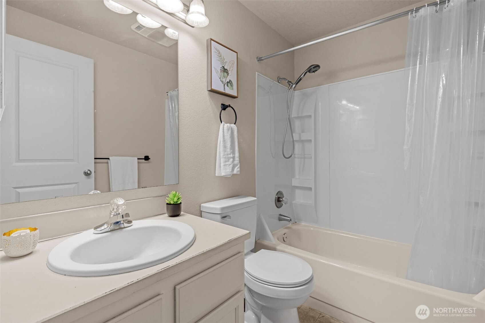 18429 20th Drive Southeast Bothell, WA 98012 - Photo 20 of 26 a bathroom with a sink toilet and shower