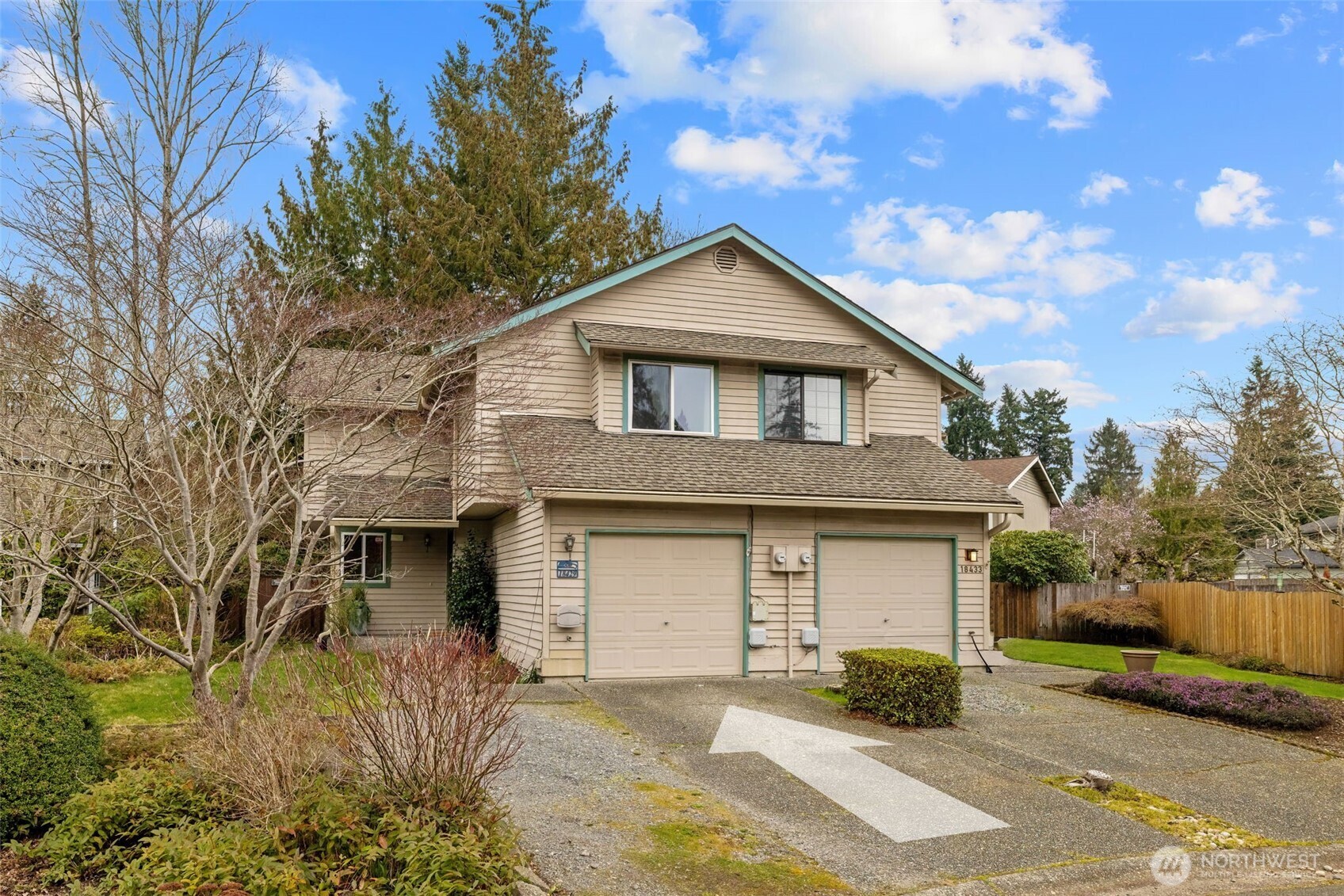 18429 20th Drive Southeast Bothell, WA 98012 - Photo 24 of 26 a front view of a house with a yard and garage