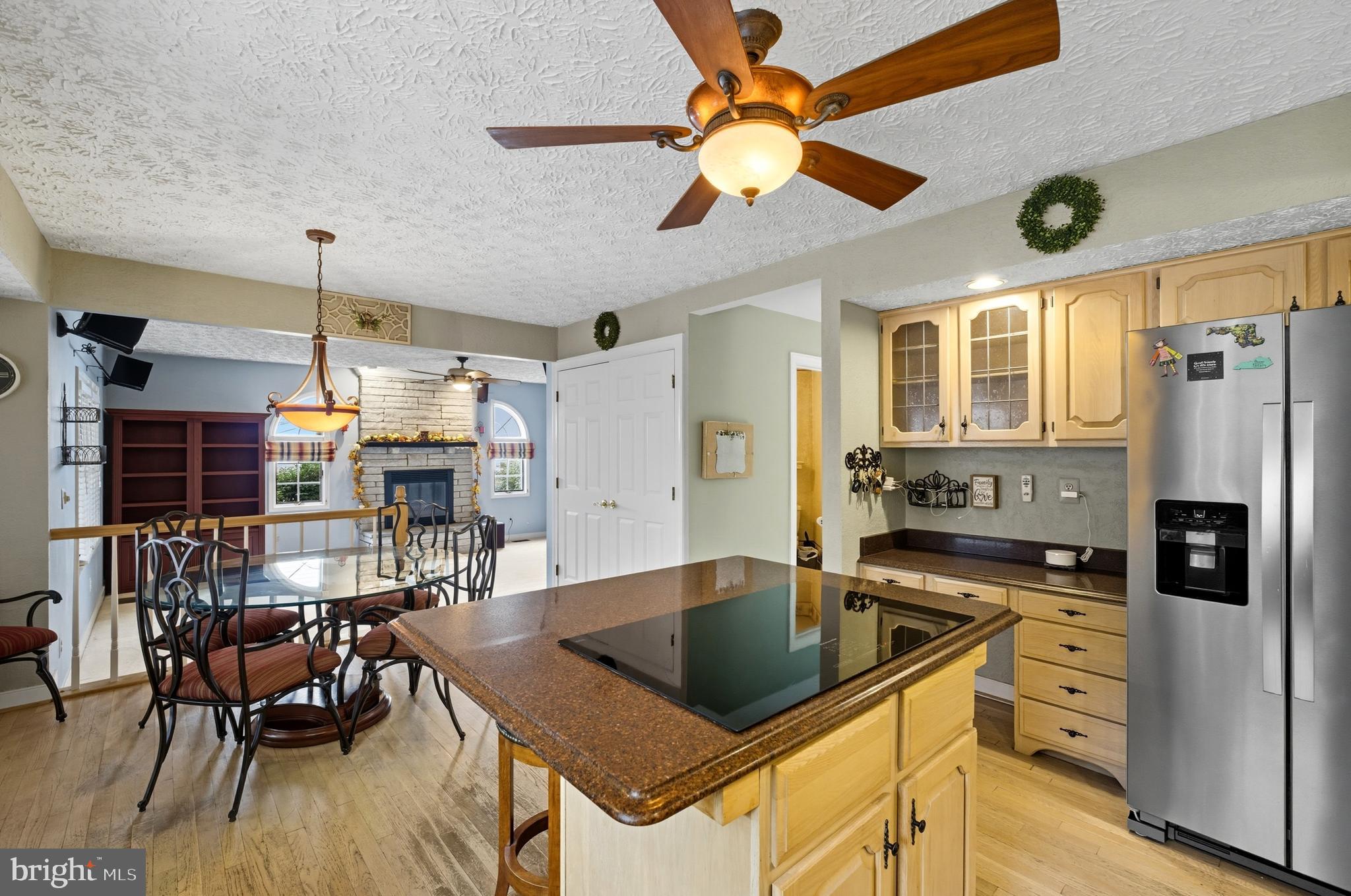 2605 Colpepper Road Abingdon, MD 21009 - Photo 12 of 95 a kitchen with stainless steel appliances granite countertop a sink a stove and a refrigerator