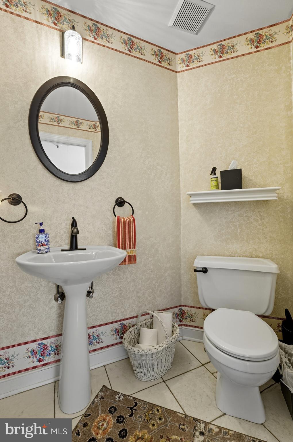 2605 Colpepper Road Abingdon, MD 21009 - Photo 40 of 95 a bathroom with a sink a toilet and a mirror