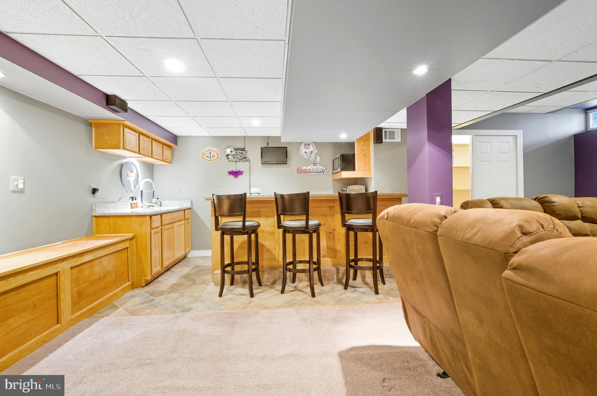2605 Colpepper Road Abingdon, MD 21009 - Photo 63 of 95 a living room with stainless steel appliances kitchen island granite countertop furniture and a kitchen view
