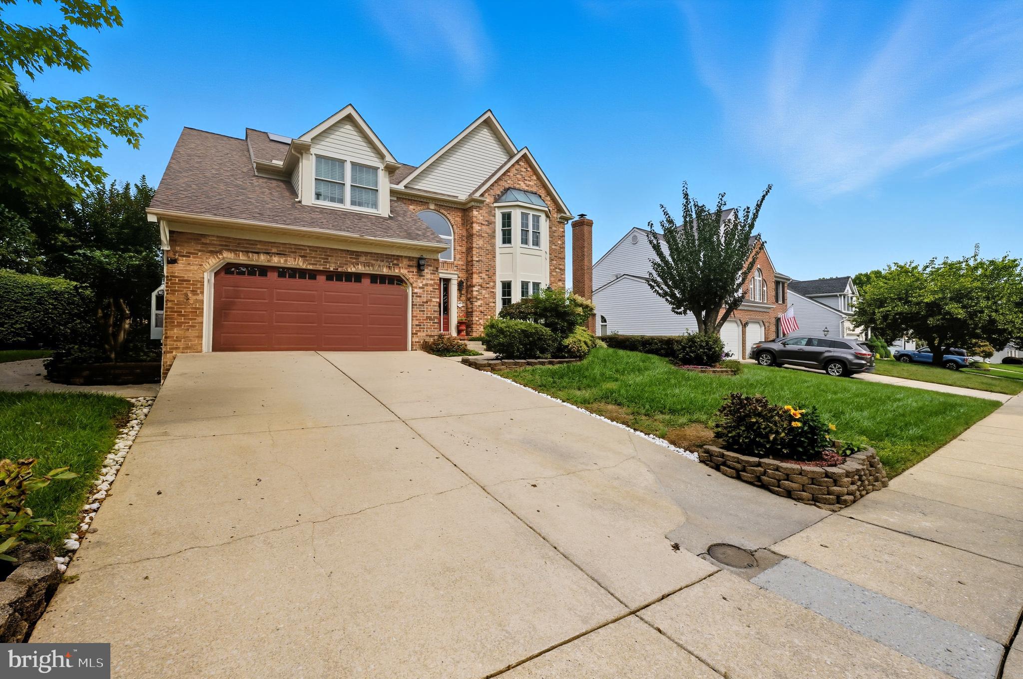2605 Colpepper Road Abingdon, MD 21009 - Photo 90 of 95 a front view of a house with a yard and garage
