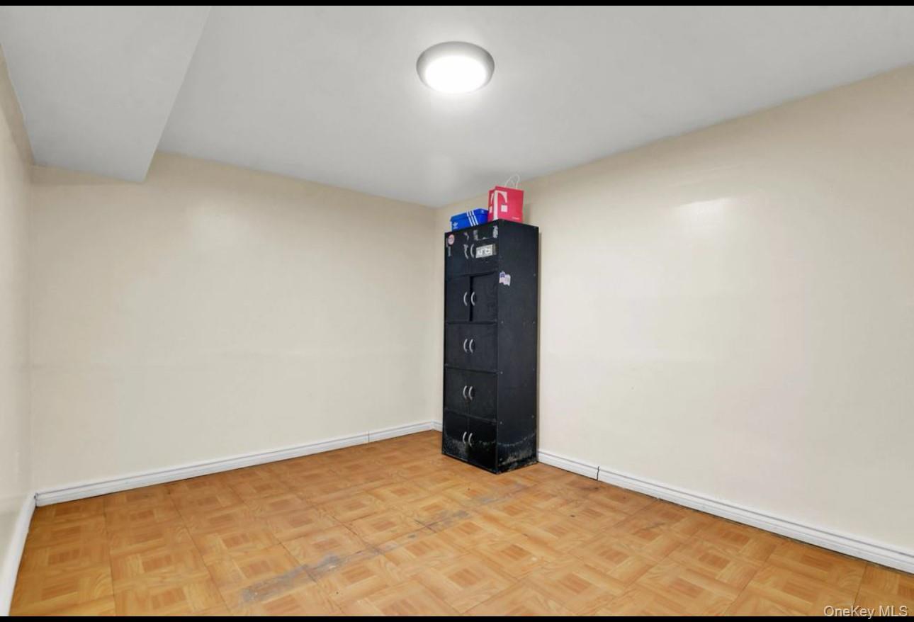 88-22 85th Street Queens, NY 11421 - Photo 26 of 33 Unfurnished room with baseboards