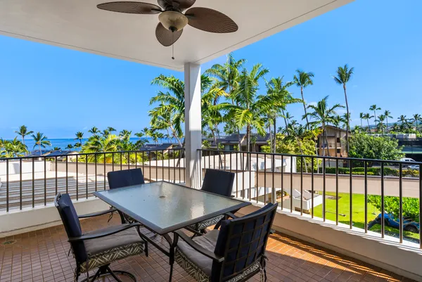 a view of a balcony dining area