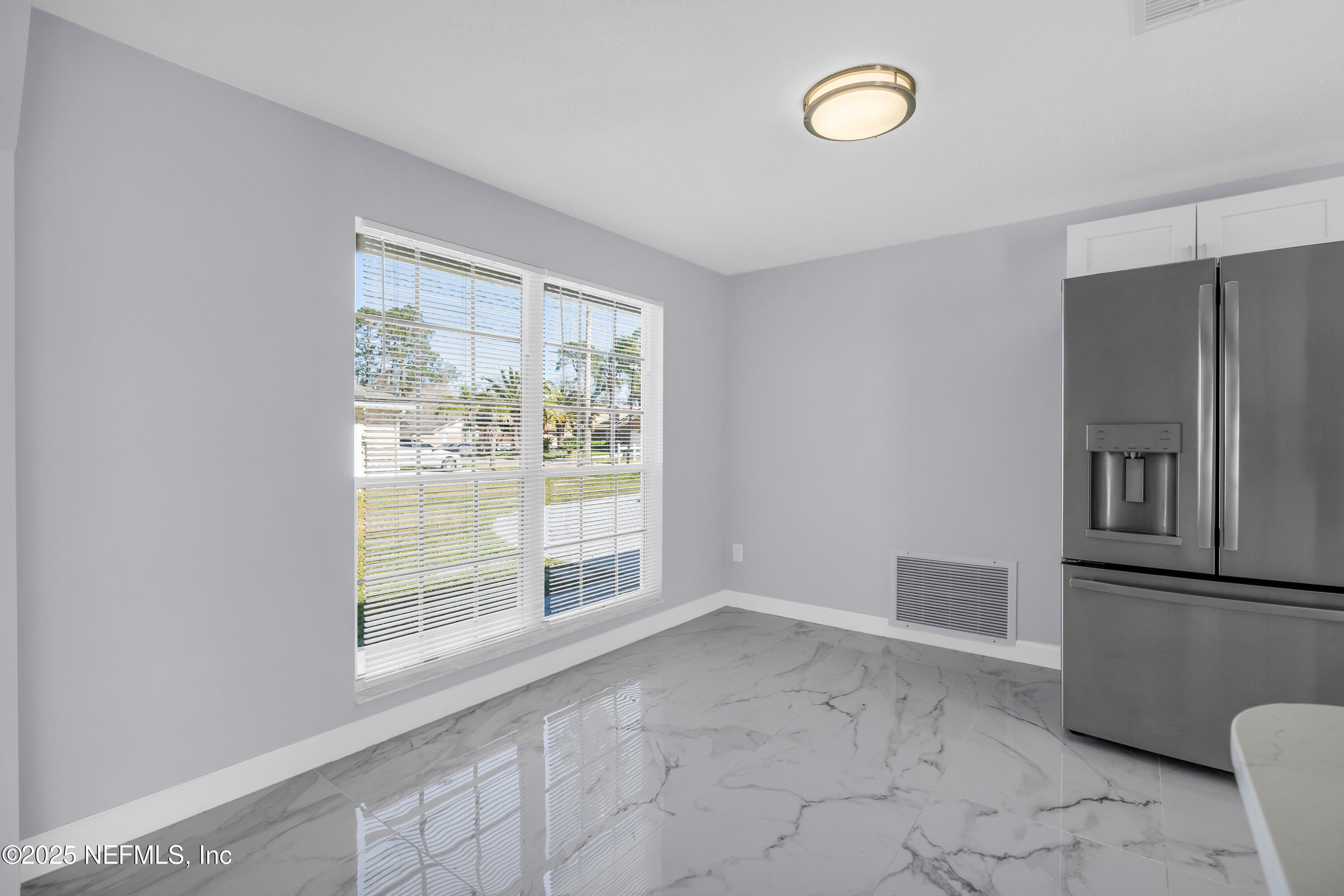 3950 Star Tree Road Jacksonville, FL 32210 - Photo 25 of 33 a view of empty room with a window