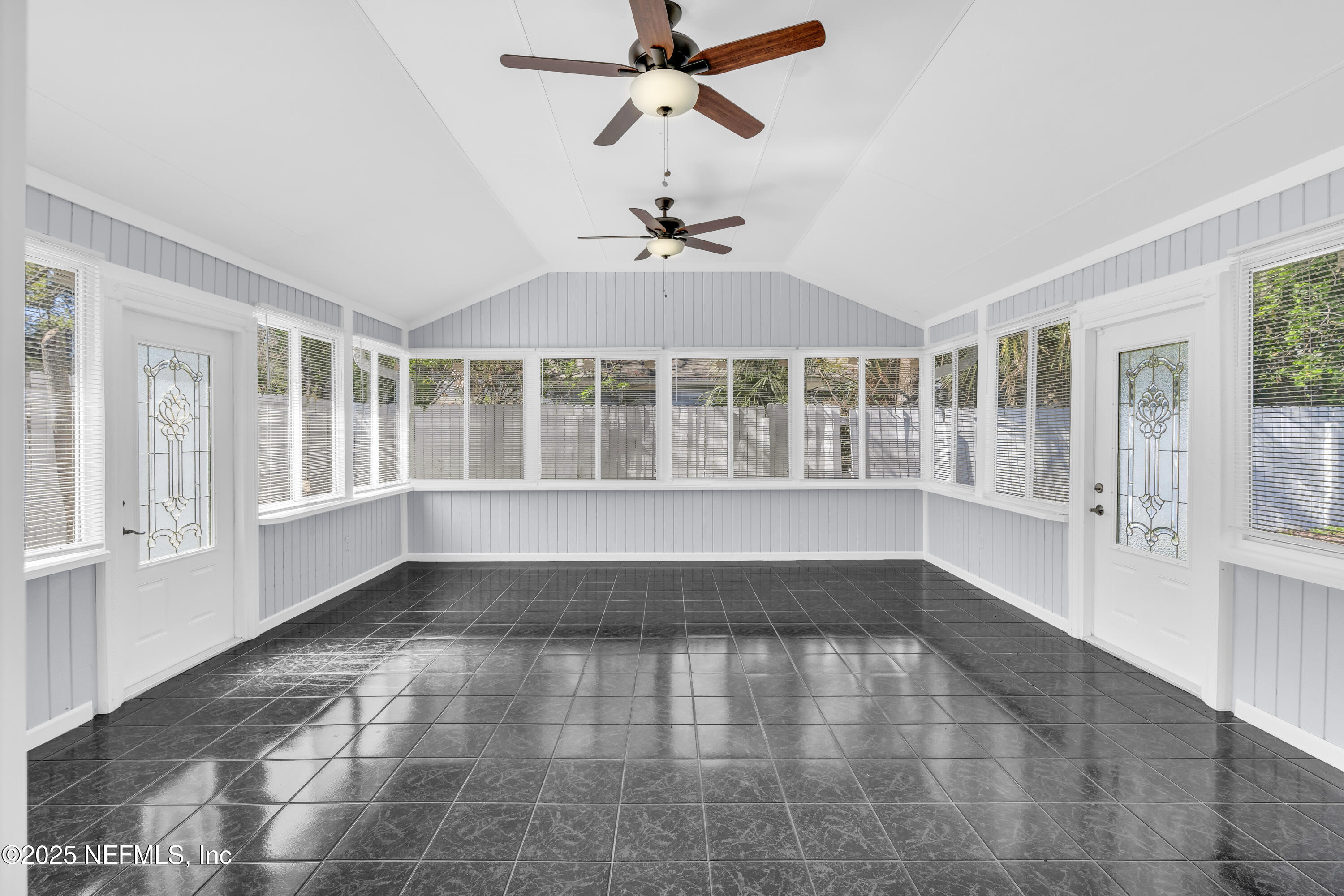 3950 Star Tree Road Jacksonville, FL 32210 - Photo 8 of 33 a view of an empty room with a window