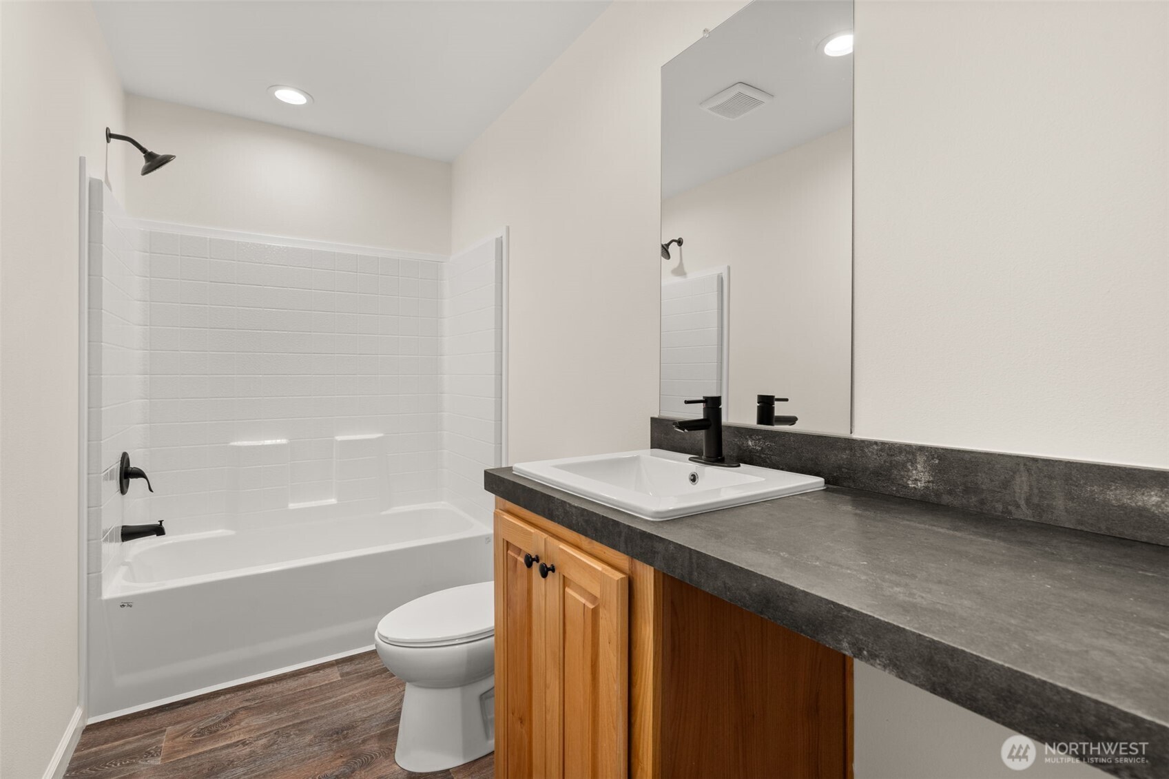172 Boyd Road Randle, WA 98377 - Photo 21 of 30 a bathroom with a granite countertop sink toilet and shower