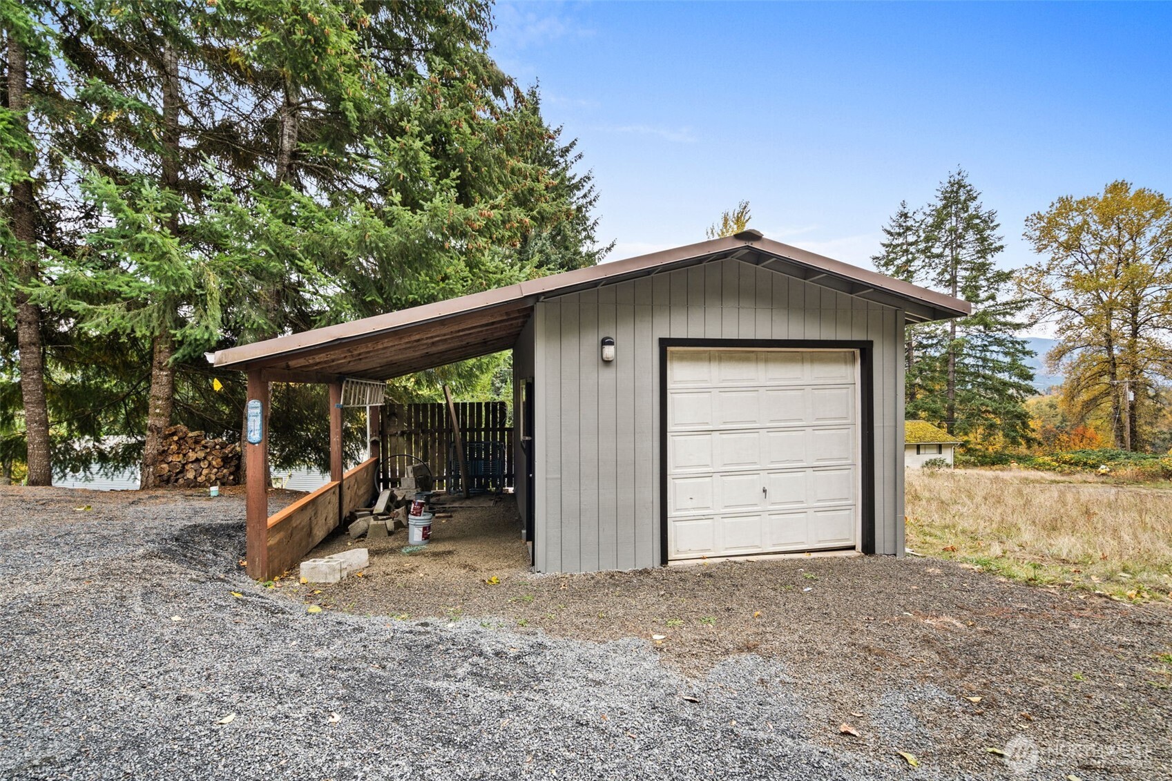 172 Boyd Road Randle, WA 98377 - Photo 28 of 30 a view of a house with a yard and garage