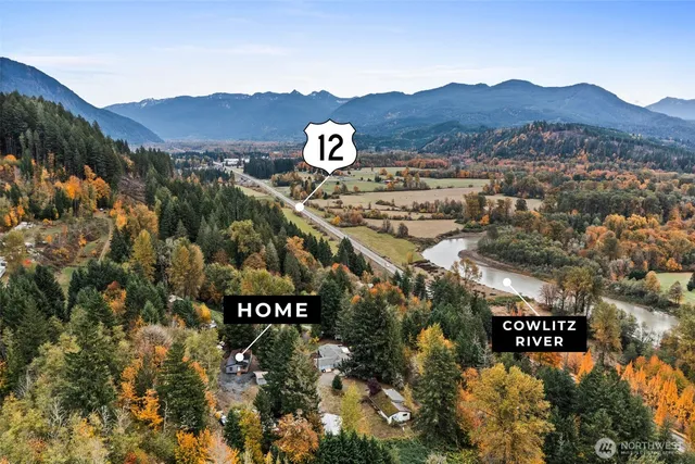a view of a street with a building in the background
