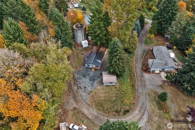 an aerial view of residential house with outdoor space