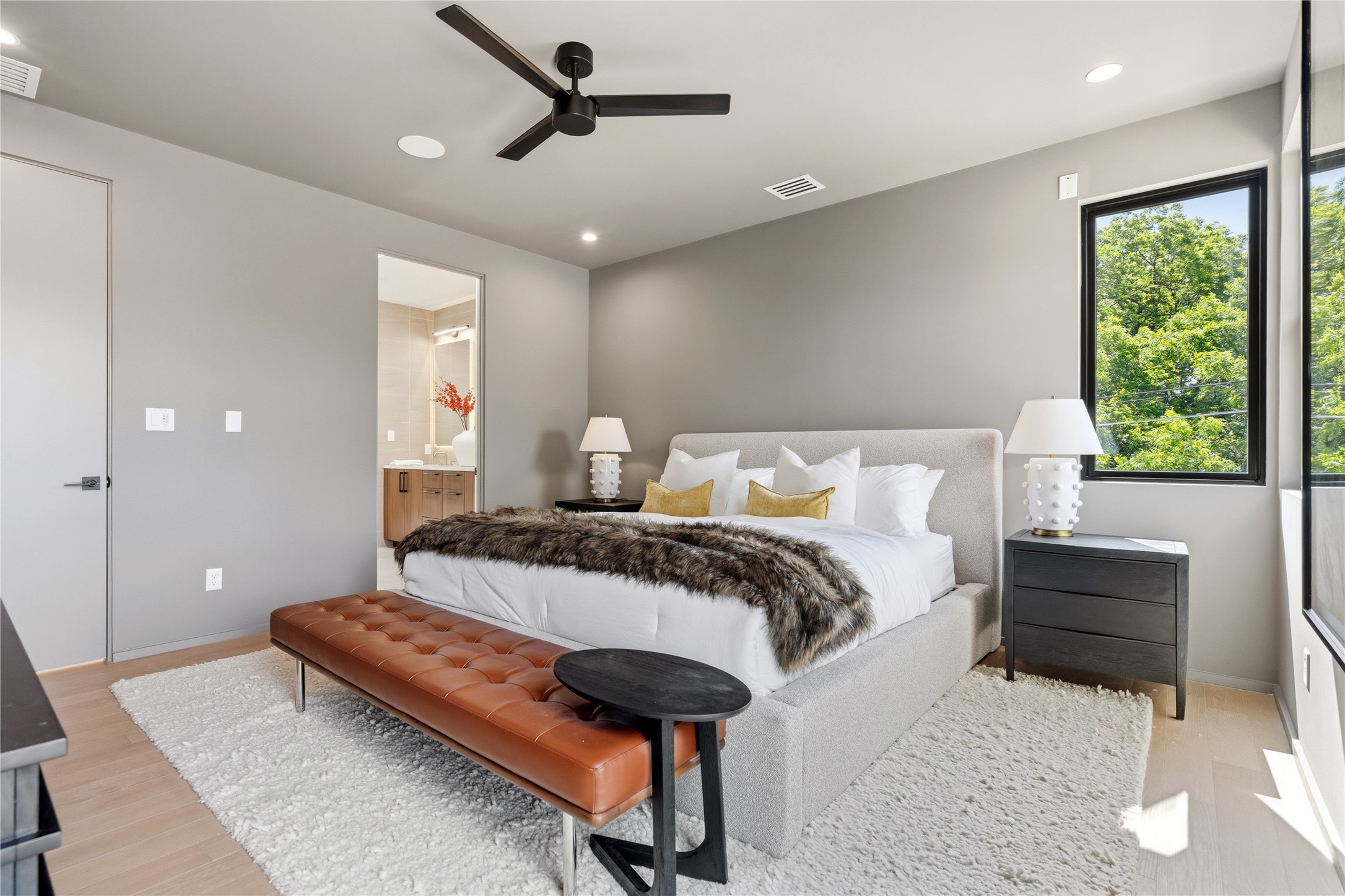 1912 South 3rd Street Austin, TX 78704 - Photo 11 of 21 a bedroom with a bed and a large window