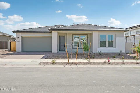 a view of a house with a street