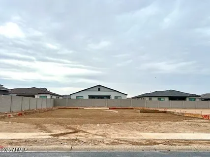 a view of houses with outdoor space and swimming pool