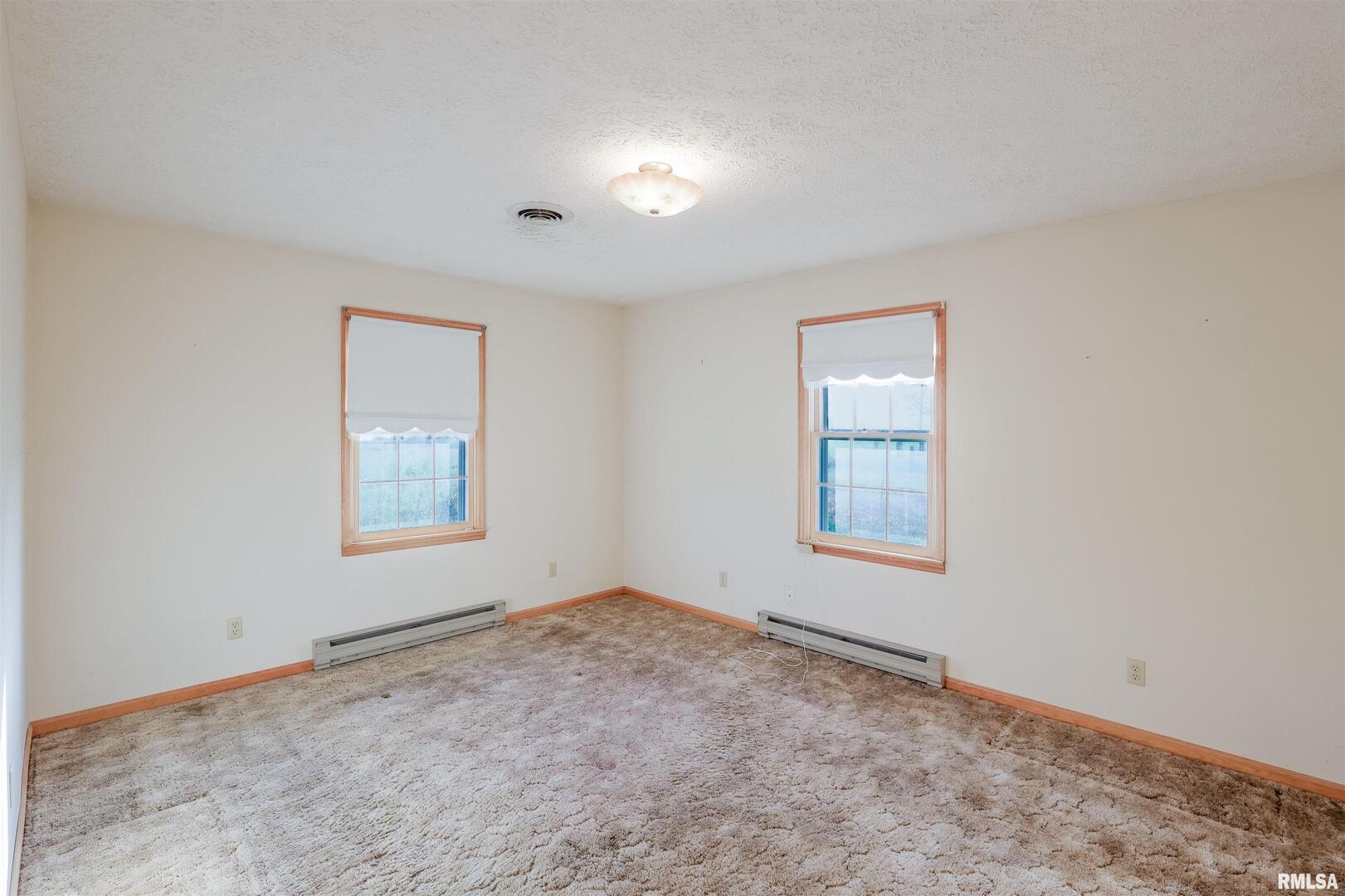 15546 Pittsburg Road Pittsburg, IL 62974 - Photo 12 of 48 an empty room with a window