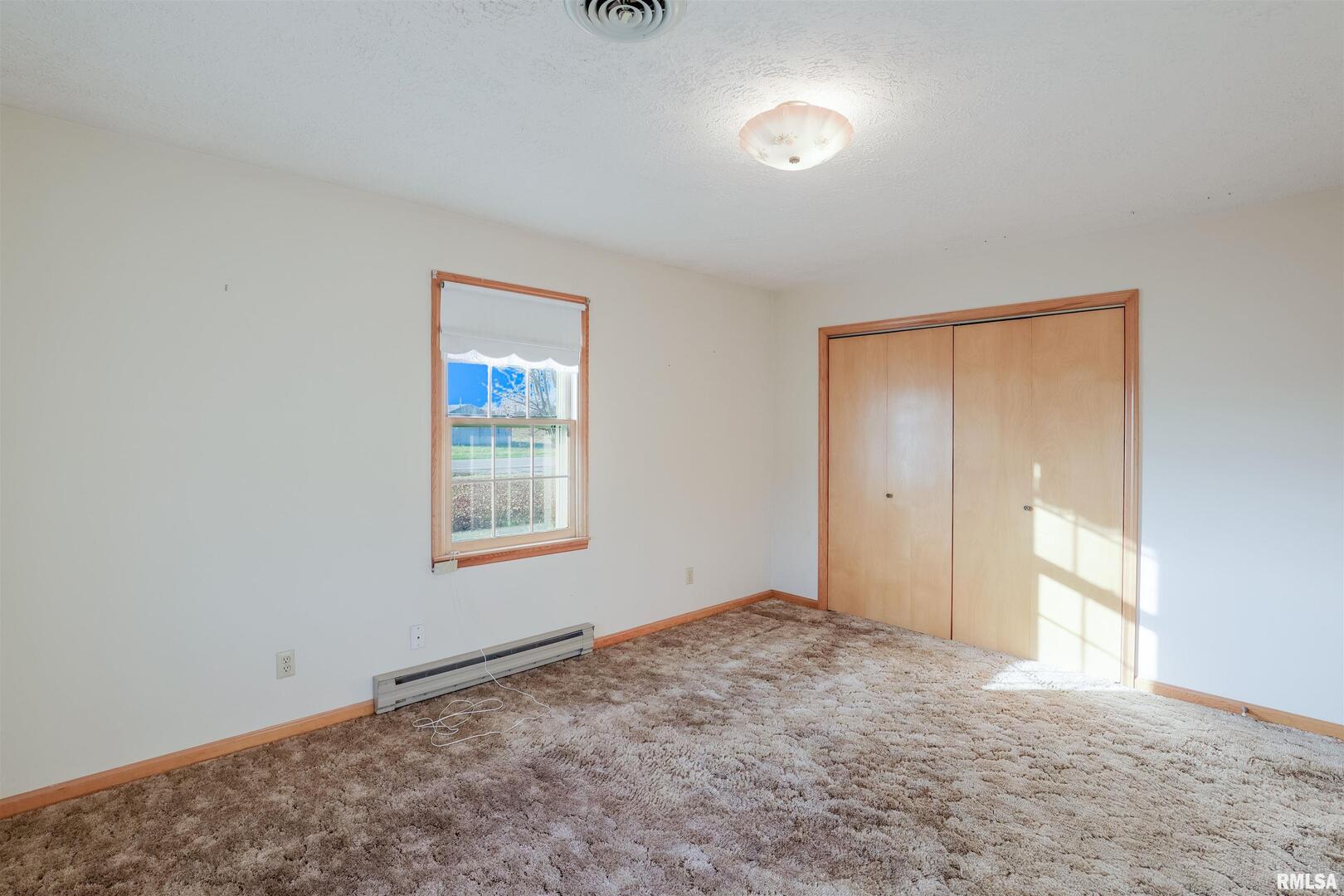 15546 Pittsburg Road Pittsburg, IL 62974 - Photo 13 of 48 a view of an empty room and window