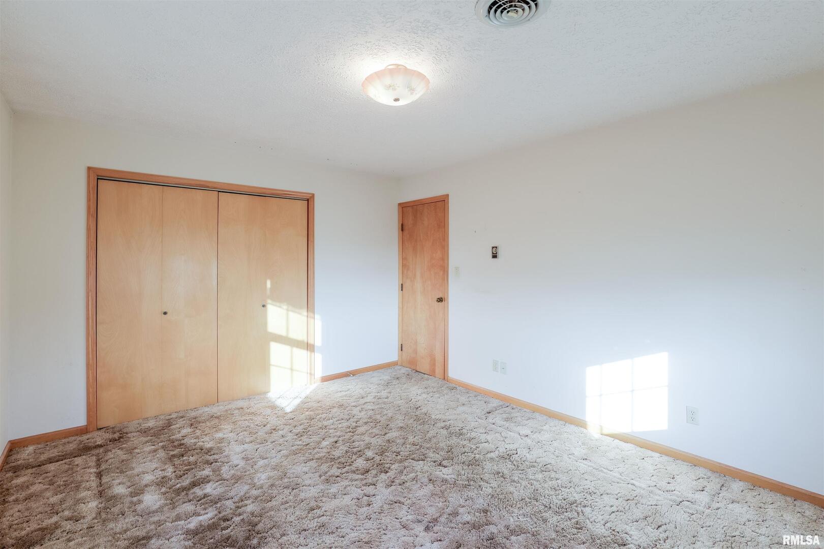 15546 Pittsburg Road Pittsburg, IL 62974 - Photo 14 of 48 a view of an empty room and window