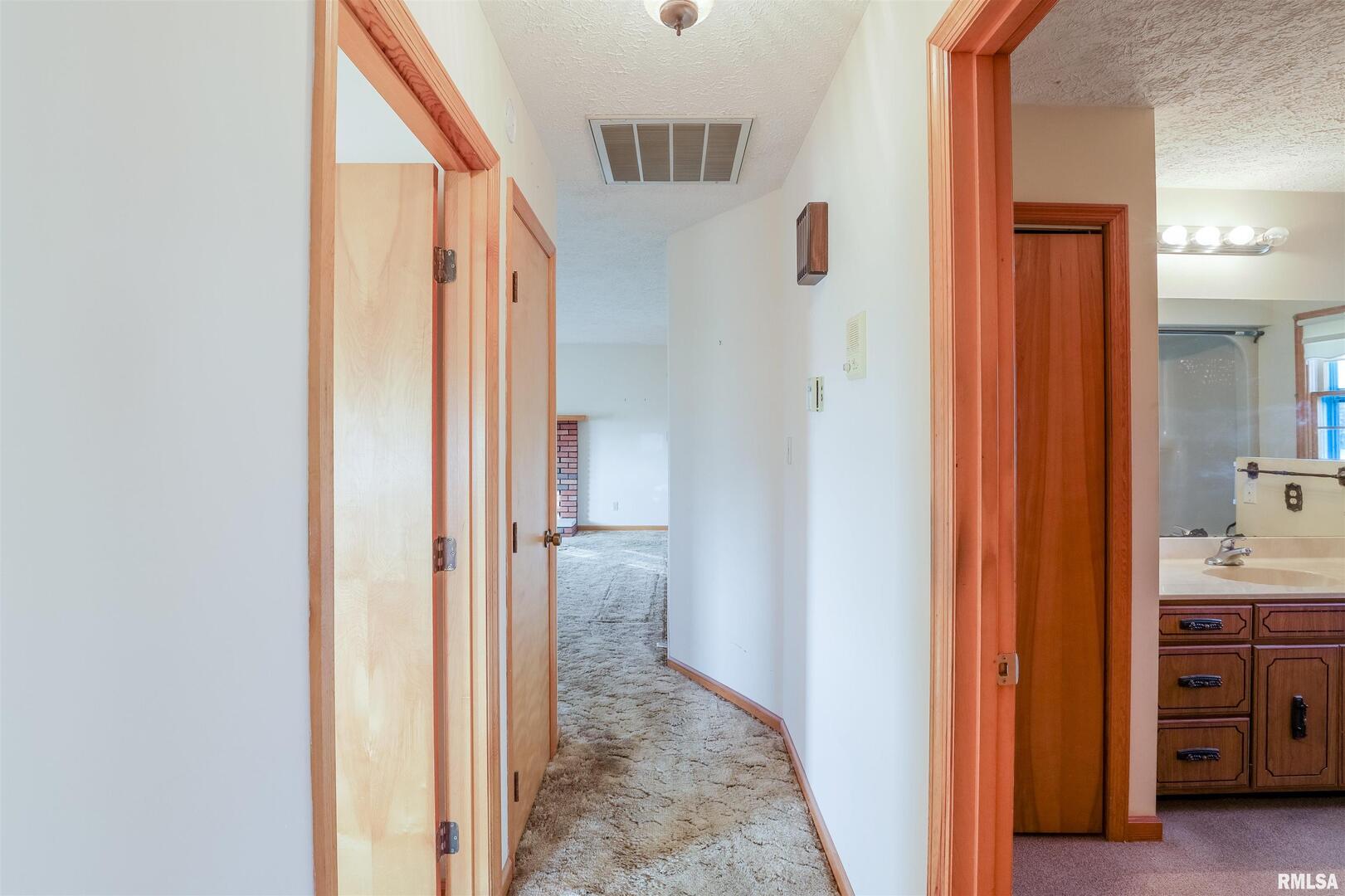 15546 Pittsburg Road Pittsburg, IL 62974 - Photo 16 of 48 a view of a bathroom from the hallway
