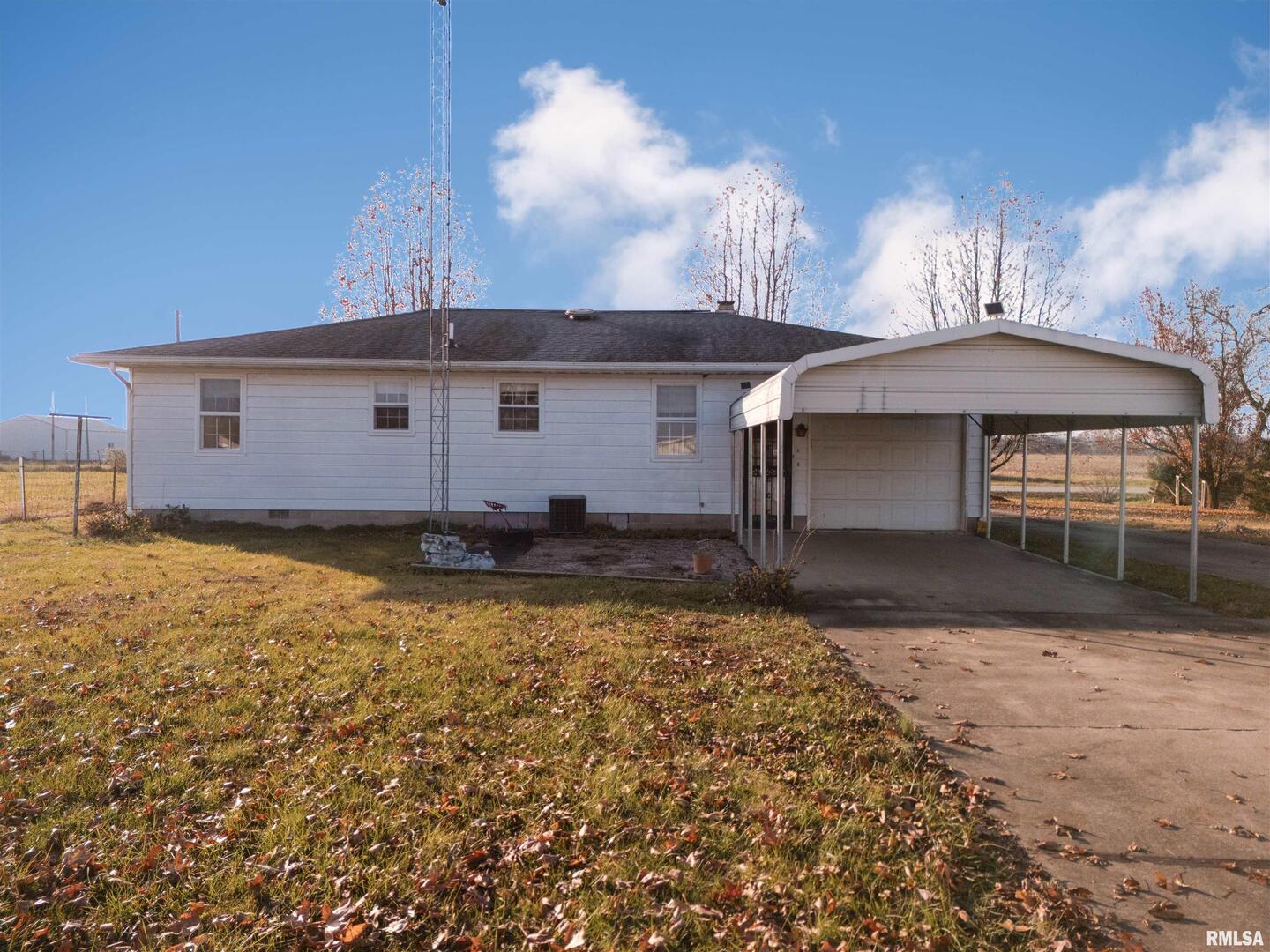 15546 Pittsburg Road Pittsburg, IL 62974 - Photo 23 of 48 a front view of a house with garden