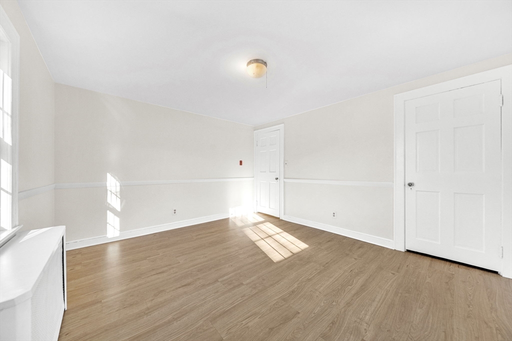 38 Longview Way Peabody, MA 01960 - Photo 15 of 42 a view of an empty room with wooden floor