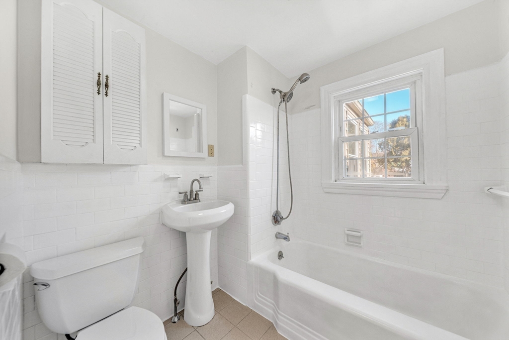 38 Longview Way Peabody, MA 01960 - Photo 19 of 42 a bathroom with a sink a toilet and a bathtub