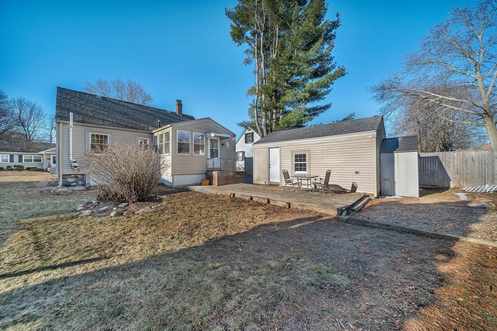 38 Longview Way Peabody, MA 01960 - Photo 24 of 42 a front view of a house with a yard and garage