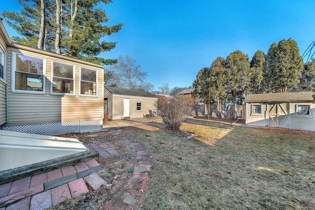 38 Longview Way Peabody, MA 01960 - Photo 26 of 42 a view of a house with a yard and a garage